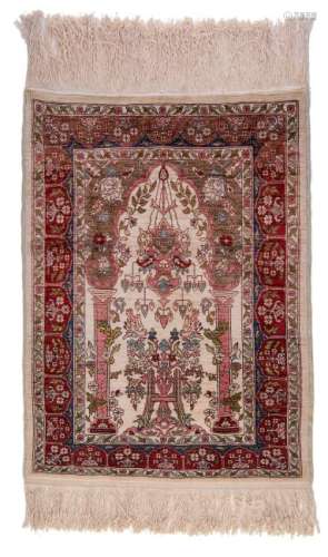 A small Oriental silk and cotton prayer rug, 51,5 x 71