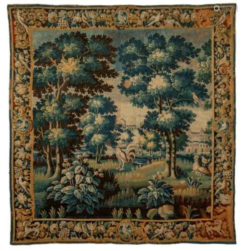 A Flemish 17thC verdure wall tapestry, the foreground