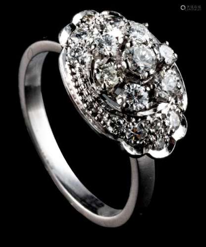 A platinum ring set with brilliant cut diamonds, total