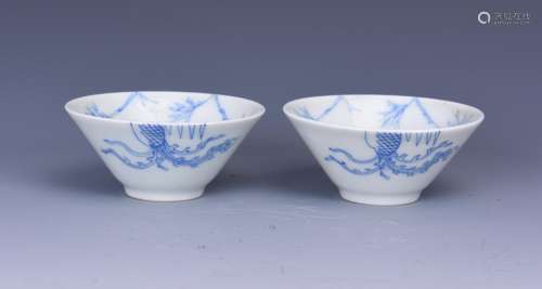 A PAIR OF SUPERBLY PAINTED BLUE AND WHITE BOWLS