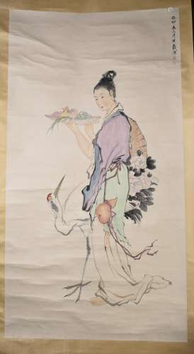 A CHINESE SCROLL PAINTING OF LADY