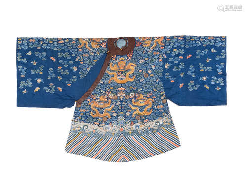 Late 19th century A woman's embroidered blue satin coat, mang'ao