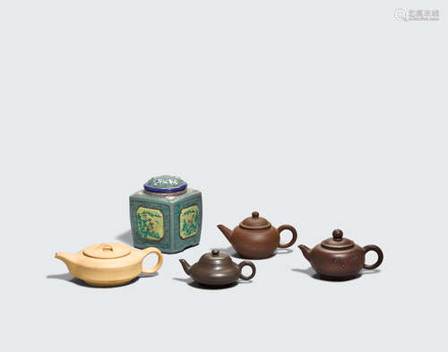 A group of four small yixing teapots