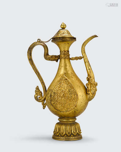 A gilt copper alloy ewer