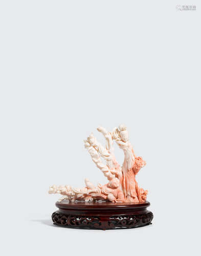 A WHITE CORAL CARVING OF A BEAUTY AND CHILD