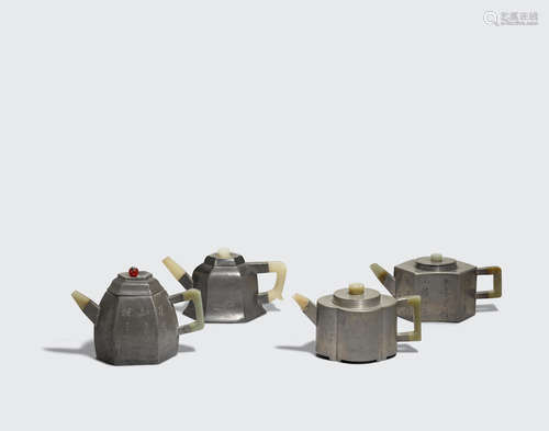 Qing dynasty A group of three pewter-encased yixing teapots