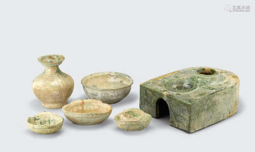 Han dynasty A group of six green glazed pottery decorations