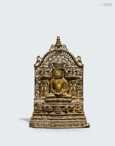 Western India, dated by inscription to Samvat 1637/1580CE  A SILVER INLAID BRASS ALLOY JAIN SHRINE