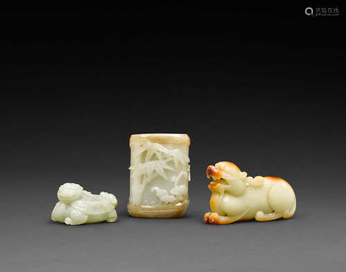 A group of jade and soapstone carvings