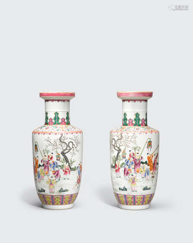 Qianlong mark A pair of famille rose enameled rouleau vases