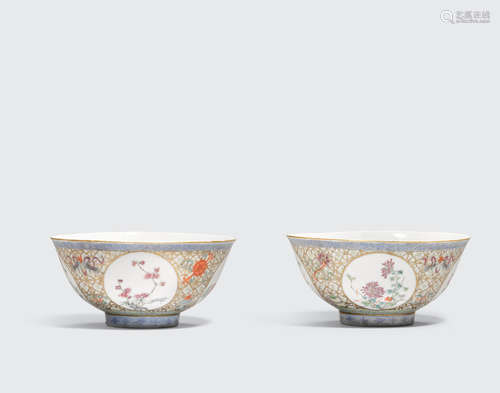 Qianlong marks, 20th century A pair of polychrome and gilt enameled bowls with 'Eight Buddhist Emblems' decoration