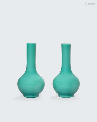 19th/20th century A pair of turquoise glass stick neck vases