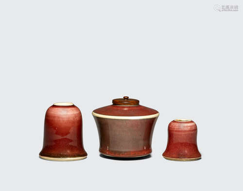 Late Qing/Republic period A group of three small copper red glazed containers