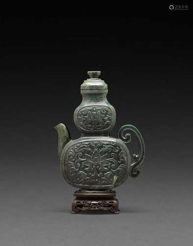 19th century A carved spinach jade ewer