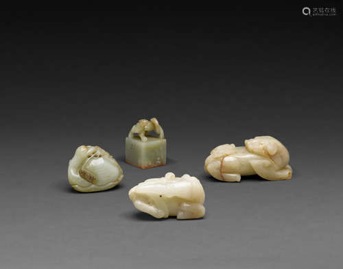 A group of four jade carvings