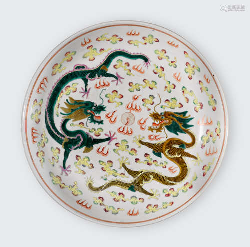 Yongzheng mark, late Qing/Republic Period A famille rose enameled charger with dragons amid clouds