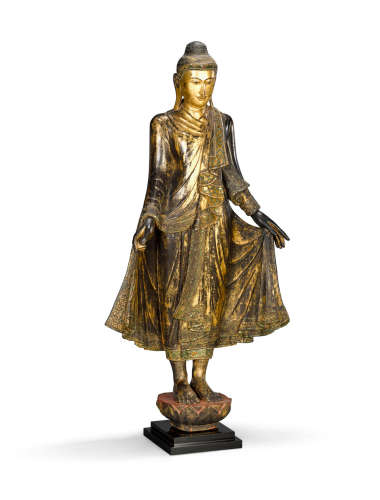 Burma, Mandalay style, 20th century A polychrome and gilt lacquered wood figure of standing Buddha