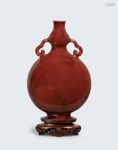 19th century A copper red glazed moon flask vase with ruyi handles