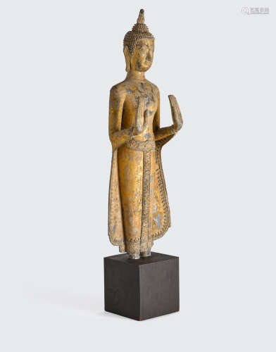 A Thai Rattanakosin style gilt lacquered metal figure of Buddha