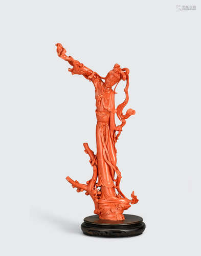 A CORAL FIGURE OF A FEMALE IMMORTAL