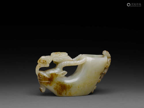 A jade libation cup with russet skin