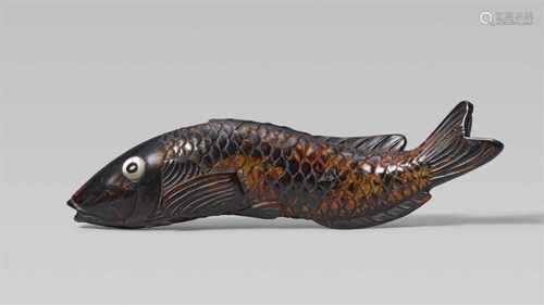 A fine and rare umimatsu netsuke of a fish, probably a carp. 19th centurySwimming, the scaly body