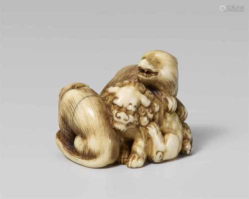 A rare Edo school ivory okimono-type netsuke of a shishi, a tiger and a bear, by Tomochika. Second