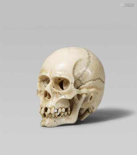 A very fine and highly realistic ivory model of a skull, by Toshinaga. Late 19th centuryThe human