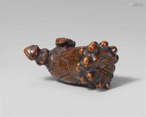 A large and unusual boxwood netsuke of a frog on a bamboo shoot. 19th centurySitting on a fat bamboo