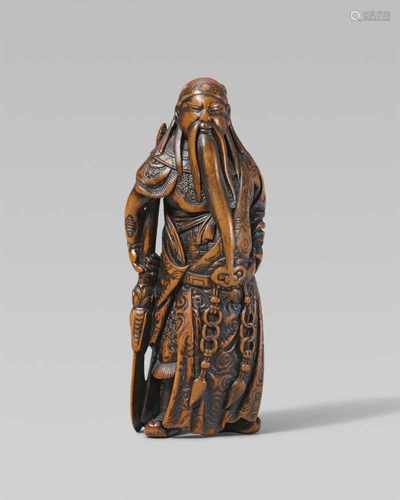 An excellent Edo school boxwood netsuke of a portly Kan’u, by Minkoku. First half 19th centuryThe