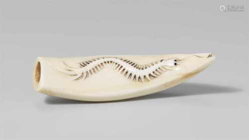 A highly polished tusk netsuke with a centipede. 19th/20th centuryThe natural shape of the pointed