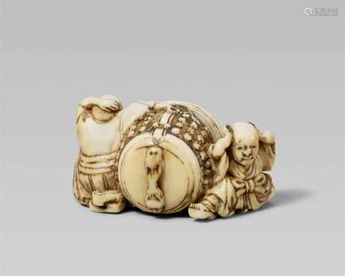 An amusing Edo-school ivory netsuke of two monks next to a bell, by Shôunsai. Mid-19th centuryBoth