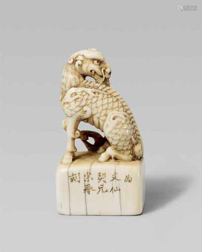 An elegant ivory seal netsuke of a kirin. 19th centurySeated on its haunches with one foreleg