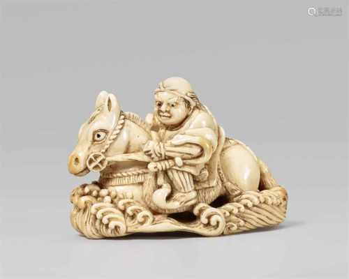 An ivory netsuke of a warrior on horseback. 19th centuryRiding through waves and tightly holding