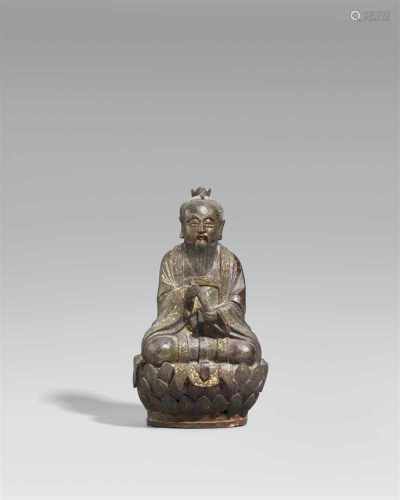 Vergöttlichter Laozi. Bronze. Ming-Zeit, 16./17. Jh.Mit untergeschlagenen Beinen auf einem Lotos