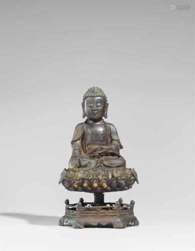 Buddha Shakyamuni. Bronze mit Resten einer vergoldeten Lackfassung. Ming-ZeitIm Meditationssitz, die