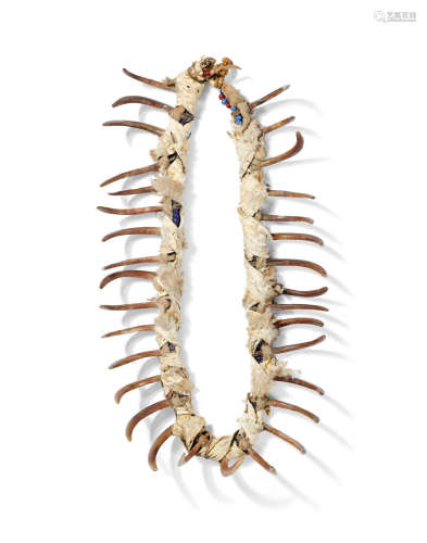 A Prairie imitation ursine claw necklace