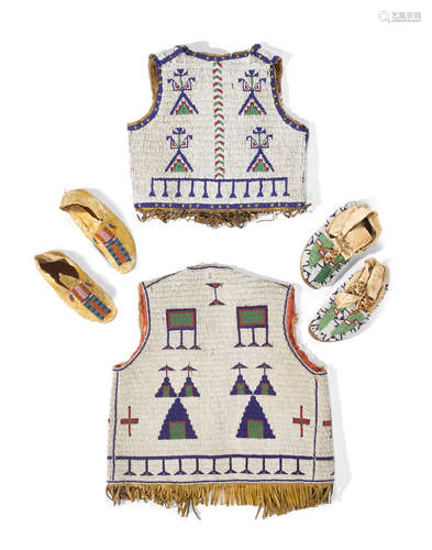 A group of Plains beaded children's garments