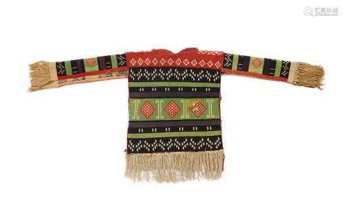A Pueblo man's embroidered shirt