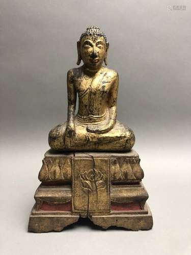 Statuette de Bouddha en bois laqué et doré, représ...