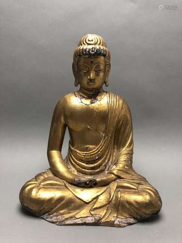 Statuette de Bouddha en bois doré, représenté assi...