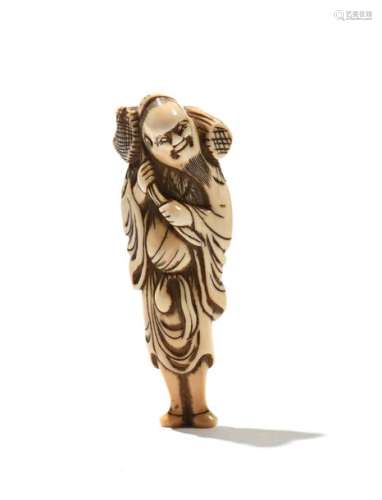 JAPON, XIXe siècleNetsuke en ivoire* sculpté re...