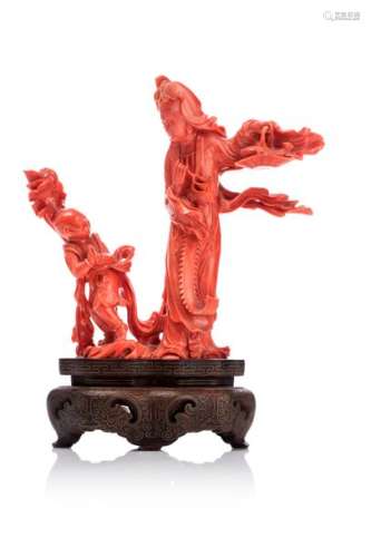 CHINE, XIXe siècleGroupe en corail* rouge sculp...