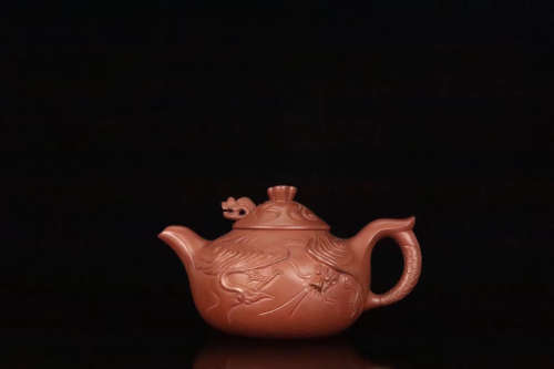 AN OLD YIXING DRAGON PATTERN PURPLE CLAY TEAPOT