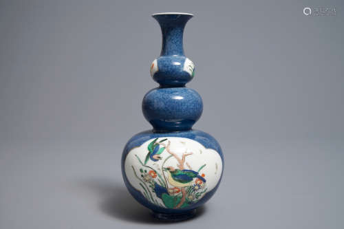 A Chinese famille verte on powder blue ground double gourd vase, 19th C.