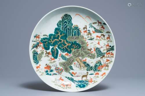 A large Chinese famille rose 'hundred deer' charger, Qianlong mark, 19th C.