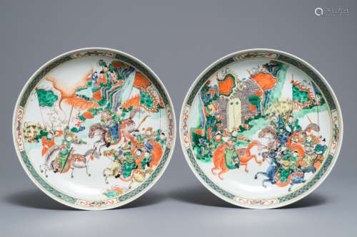 Two Chinese famille verte 'battle' dishes, one with Kangxi mark, 19th C.