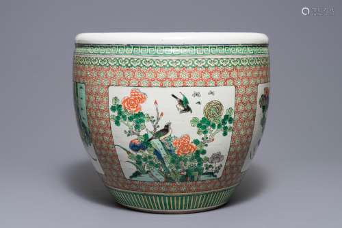 A Chinese famille verte fish bowl with birds among flowers, 19th C.