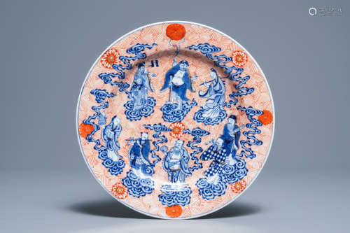 A Chinese blue, white and iron red '8 immortals' dish, Xuande mark, 19th C.