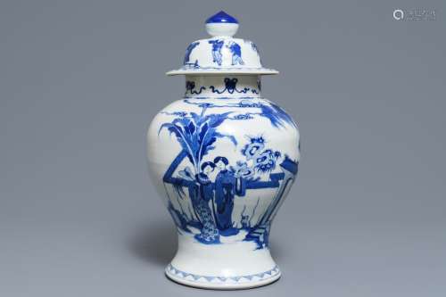 A Chinese blue and white vase and cover with ladies in a garden, 19th C.